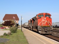 After wying their power due to a PTC issue with the (former) leader preventing them from continuing to the United States, CN 301's engines back onto their train on the north main at Sarnia.