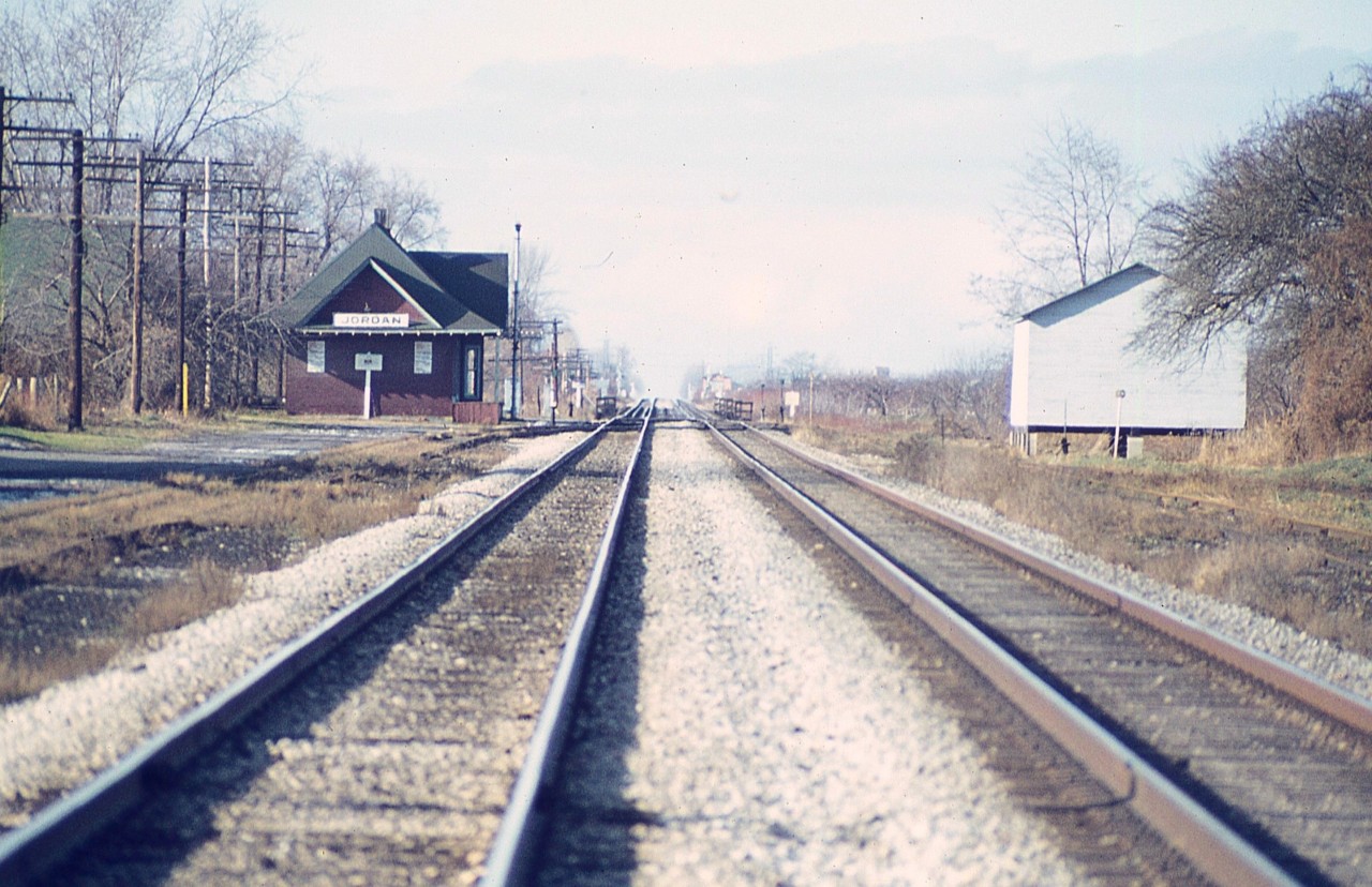Here's looking down the CN line westward on a pleasant spring morning 50 years ago.  The old Jordan station has been moved and now is a private residence a couple of hundred yards away.  The line here is now single tracked but the second tracked is scheduled to be put back in to accommodate increasing GO commuter traffic.  Thats the bridge over Jordan Harbour in the background.