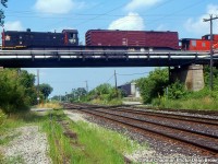 TRRY S-13u 108 heads across the CN Grimsby Sub on the TR Townline Spur to Interlake Paper.