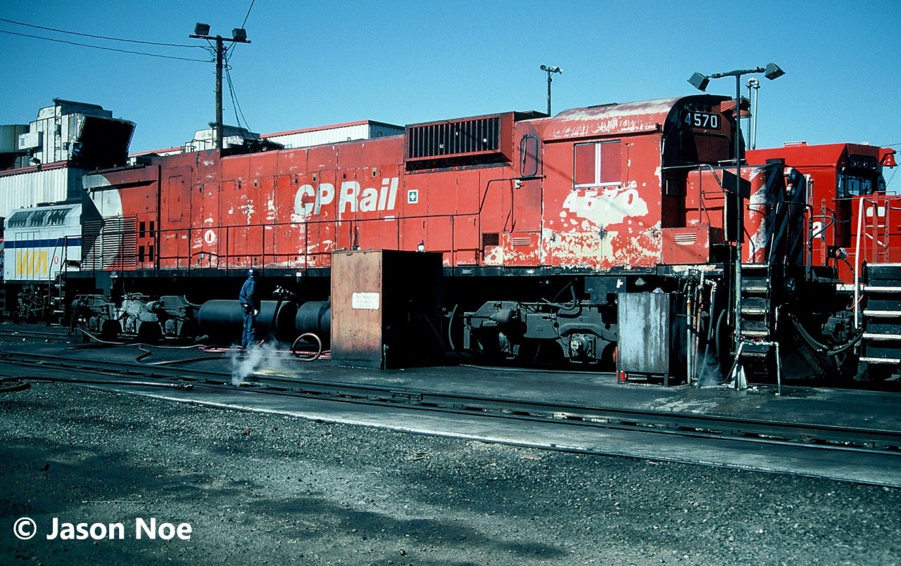 Looking every bit it’s age and with its days of leading trains long behind it, veteran M-630 4570 is viewed taking on fuel at CP’s Toronto Yard. 

Built during 1969 by MLW, the aging locomotive had been retired in November 1993, then un-retired during June 1994 as CP found itself increasingly power short. It managed to stay in service until August 1995 before it was ultimately retired for good and eventually scrapped.