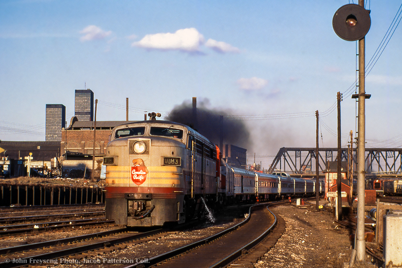 With the engineer notching out the throttle, CPR's The Canadian snakes through the crossovers and onto the Galt Sub just west of Bathurst Street and Cabin D.

John Freyseng Photo, Jacob Patterson Collection Slide.