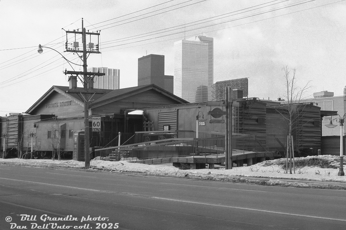 Another Bill Grandin view of the Toronto location of Victoria Station Restaurant, once located at 190 Queen's Quay East (this angle looking northeast, the previous angle looking northwest). One of those railway-themed US restaurant chains that once existed, the Toronto location featured five ex-IC boxcars and a former Southern Railway caboose. The building and equipment lasted into the late 2000's before the property was cleared for redevelopment.

Bill Grandin photo, Dan Dell'Unto collection negative.