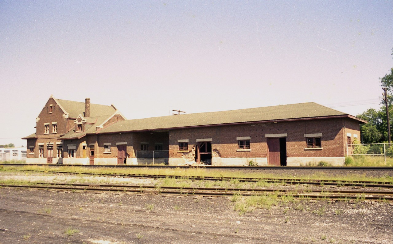 Strange that I ended up visiting Belleville three times in just over a week back in 1976. After taking a 3/4 shot earlier, I elected to shoot (wide angle 28MM) a full length image as shown here. I was unaware that the structure was going to be torn down not very long after I visited. In a few more months it would be gone. In my mind it was a real shame because inside was rather ornate looking. When we have doctors, lawyers, dentists, real estate people, chamber of commerce places, license bureaus and all the rest; I find it hard to understand that we cannot find the opportunity to repurpose these grand old structures. I guess nobody cares.