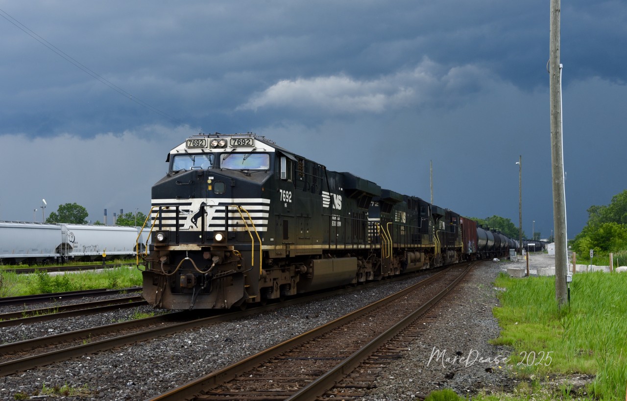 Train 716 rolls into Sarnia, ON., at Hobson under very threatening skies with triple Norfolk Southern power lead by NS 7692. The power was cut off on arrival and sent back to Port Huron, MI., light as K533, July 12, 2025.