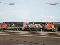 I wonder whether locomotives trade stories and reminisce regarding "the good old days"--in this case, CN 1653 (the former NAR 403) about trips to and from Peace River country then roaming other parts of Alberta and Western Canada with CN 5406 (the former GMTX 9034) with takes of roaming the BN/BNSF system especially the high plains of the western United States and then a second career roaming the CN system (Canada and mid-west/central states)...still earning their keep today in the Edmonton Terminal, today on a yard assignment at Walker. Ah, it's not like the old days...