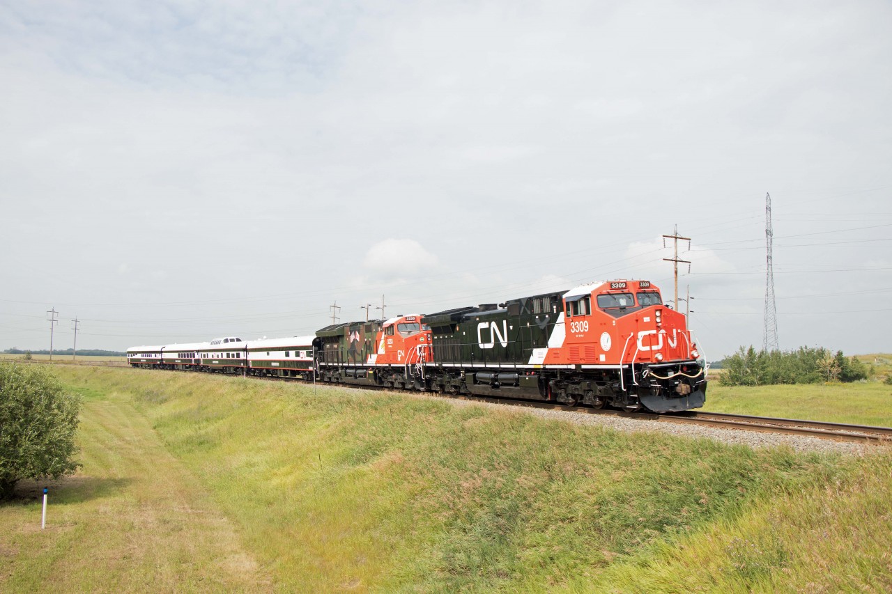 P00851, a Board of Directors inspection train, rounds the curve at Beamer Jct on its way to Scotford Yard and, later, the Beamer industrial spur. Powered by AC44C6M 3309 (rebuilt from 2598) and "military" unit 3233 (an ET44AC), the cars are Mississippi River, Shawnee Forest, K-Shian-Skeena River, and Babine Mountains.