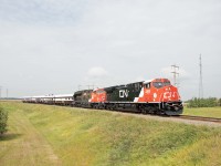 P00851, a Board of Directors inspection train, rounds the curve at Beamer Jct on its way to Scotford Yard and, later, the Beamer industrial spur. Powered by AC44C6M 3309 (rebuilt from 2598) and "military" unit 3233 (an ET44AC), the cars are Mississippi River, Shawnee Forest, K-Shian-Skeena River, and Babine Mountains.