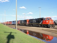 The long days of June provide the opportunity to get some north side shots at Walker Yard from 127th Avenue. This evening we have Q14751, a twice-weekly Calgary Logistics Park to Thornton Yard train making its crew change before heading west behind a couple of AC conversions (SD75IACC 8304 (rebuilt from 5727) and AC44C6M 3403 (former BNSF 4583, temporary CN 1860)).