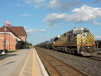 CN 2791 ( ex Citirail) trails as the rear DPU unit on eastbound U763 unit tank train, paused briefly at the VIA station at Sarnia, a nice breeze had the Canadian flag out on this fine Canada Day.