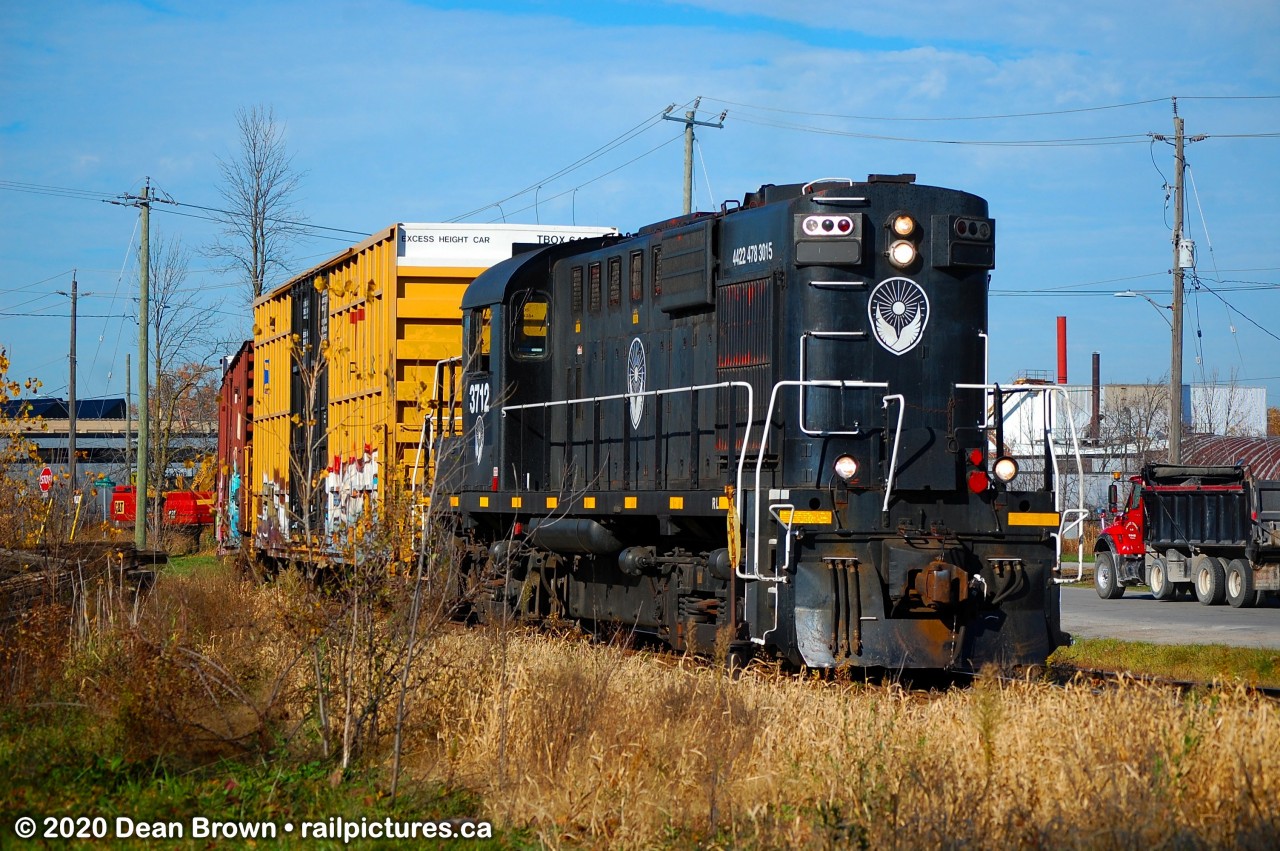 TRRY 1859 has a Temp No. 3712 RS18u used for the film Productions as they switch at Berryman Ave in St. Catharines.