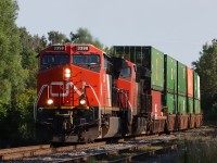 Eastbound CN 3398 CN 3267 working up the grade approaching No 1 Sideroad.