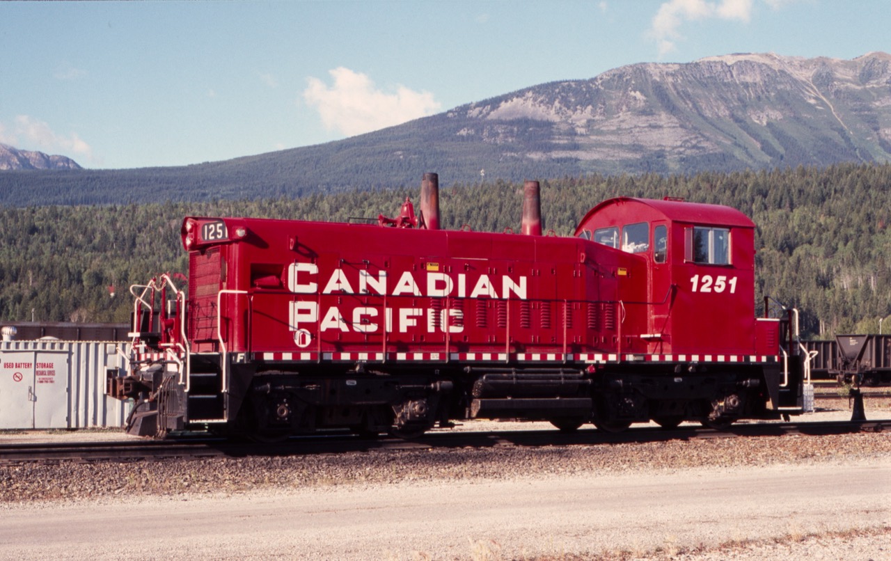 CP end cab switcher 1251 (sw1200RSm), resplendent in red paint, basks in the sun at the Golden, BC yard in August of 2005.