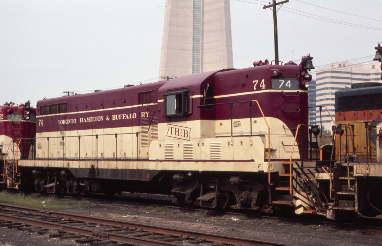 Imagine my surprise at finding a group of TH&B units near Toronto Union Station, along with some Chessie power. GP-7 THB 74 is seen with paint in nice condition in this August 1985 view.  To prove the photo was indeed taken in Tornoto, note the base of the CN tower in the background. Ah the good old days.