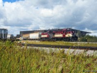 A pair of ex CP MLWs work the yard at PDI Massey, with RS23 505 putting out some smoke as engineer Harwick notches out the throttle.