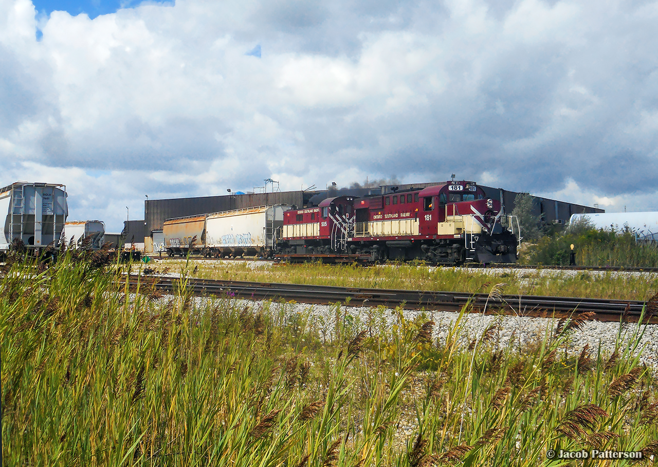 A pair of ex CP MLWs work the yard at PDI Massey, with RS23 505 putting out some smoke as engineer Harwick notches out the throttle.
