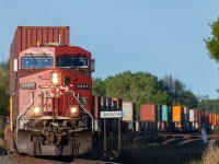 CP 8883 leads a morning eastbound through Brighton.