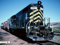 Cape Breton and Central Nova Scotia Railway (CBNS) GP18 4700, which is former Grand Trunk Western 4700, sits stored in the deadline with several other units in Sydney, Nova Scotia. The GP18 was named “Gerard MacNeil” and was scrapped by CBNS in 2007. The other units in the deadline were GEXR GP7u 700, IORY GP9 62 as well as GSWR GP7u 2160 and GSWR GP7u 2176. 