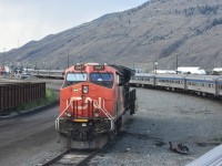 <b< Circle the Wagons </b> <br>
VIA 001 The Canadian departs Kamloops, BC and the consist arcs around an idle CN 3067 parked just west of the station. <br>
In the background, a CN mixed freight waits patiently in the yard, soon to depart behind the much speedier passenger train. <br>
Another great trip on 'The Canadian' will soon be over as we will arrive in Vancouver 4-hours early the next morning.