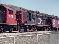I found this slide from May of 1982 and had to laugh. We had just arrived at Montmorency Falls, Quebec, on the tour bus during a high school French class trip from Lyons, NY, (south of the border) when here came a westbound CN freight train, right on top of us. The lead switcher was not of much interest to me, but the MLW RS-18 CN 3623 certainly was. Note that the lead freight car, CN 856004, is interesting, perhaps a wood chip car?? I can't tell you anything about Montmorency Falls because I stayed outside the park (much to the chagrin of our chaperones) waiting for another train that sadly never came. Little did I know at the time that the Murray Bay Subdivision was not a CN mainline. There is a tourist train there now - I should go back and look at the falls.