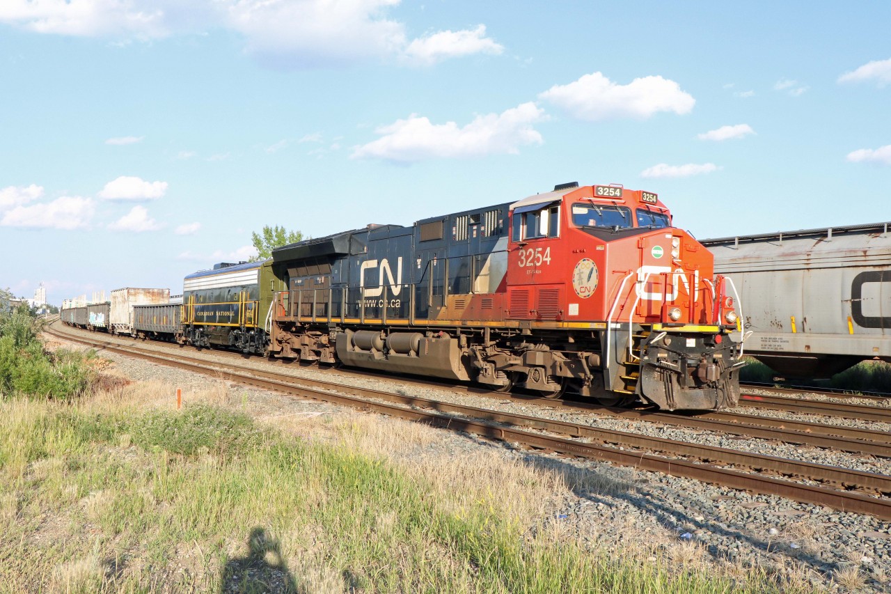 Having just originated at Walker Yard, two miles to the east, A41751 (the daily train to Thornton Yard in Surrey, BC) is about to cross 149th Street with CN 3254 and 6614! No, CN isn't desperately short of power; the 6614 is being moved to Jasper for public display on the weekend. Accompanying A unit 6514 was moved on yesterday's edition of 417 (both units--owned by the Alberta Railway Museum--couldn't be moved together due because they don't have alignment control couplers).