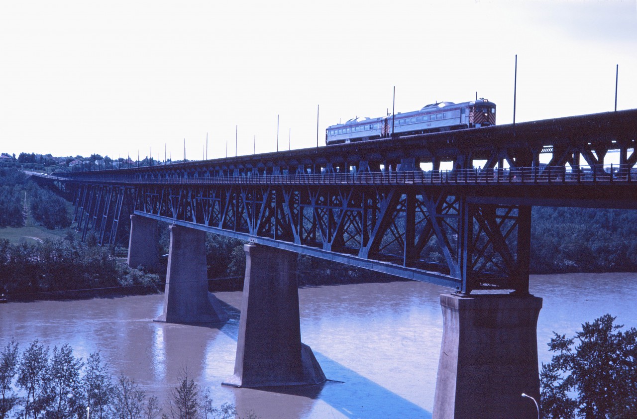 No. 301, the morning Dayliner from Calgary, crosses the North Saskatchewan River at mid-day on its way to CP's downtown Edmonton station. While CP no longer uses this bridge, from mid-May-Thanksgiving you can ride the Edmonton Radial Railway Society's streetcar between downtown and Strathcona (location of the car barn) over the High Level Bridge.