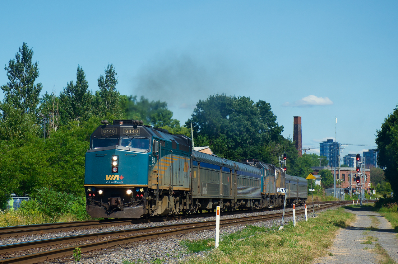 VIA's combined train for northern Quebec passes MP 3.13 of CN's Montreal Sub.