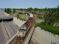 CN 522 with IANR 3802 & CN 9411 for power is crossing Route 116 with 28 cars for Saint-Jean-sur-Richelieu as it leaves Southwark Yard. It took me a little while, but I finally got an IANR leading (3-4 are working in or near Montreal at present).