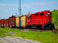JLCX GP35 3502 is heading southbound from St. Catharines and is now on the CN Grimsby Sub heading westward towards Glenridge to do the crossover and then head east on the south track for the Thorold Spur for Welland.