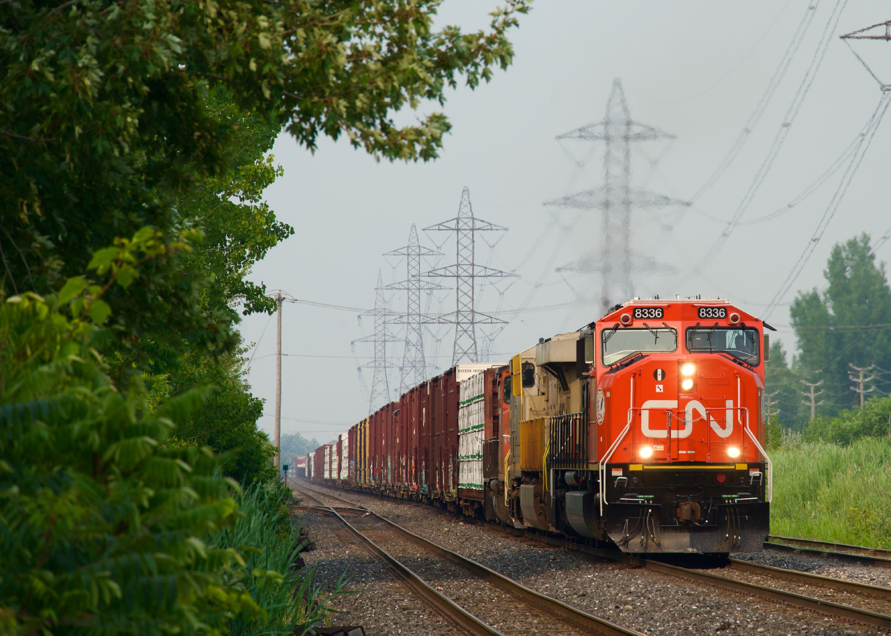 CN 8336 leads CN 461 southwards on the St-Laurent Sub in Montreal last Sunday afternoon.
Full stats:

-178 cars

-11,794 feet long

-19,572 tons