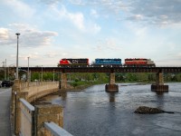 A very early 559 returns to Mont-Joli with an IANR GP38-2 they picked up in Rivière-du-Loup, destinated to Mont-Joli, where they will wait their turn for the COGEMA ferry. As it turned out, these IANR engines weren't actually meant to be sent to the north shore, and were brought back to Montreal a few days later.
<br> This shot was a very lucky one, as 559 usually returns home in the middle of the night. In fact, at this time of the evening, at around 8 PM, it usually is the westbound trip that can be seen.