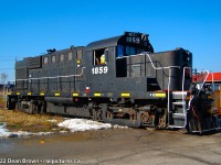 TRRY RS18u 1859 pulls out a string of NS coil cars from Stelcon on the Lakeshore Spur.