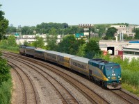 VIA 37 has green GEs at both ends as it heads towards its next stop at Dorval.