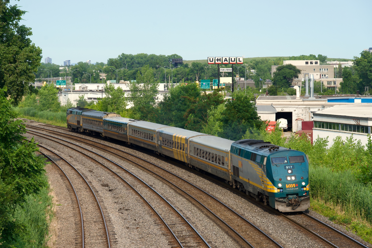 VIA 37 has green GEs at both ends as it heads towards its next stop at Dorval.