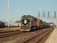 IC 1028 and CN 2528 with a eastbound freight at Sarnia.