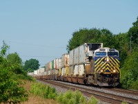 One-unit wonder CN 126 heads east through Pincourt.