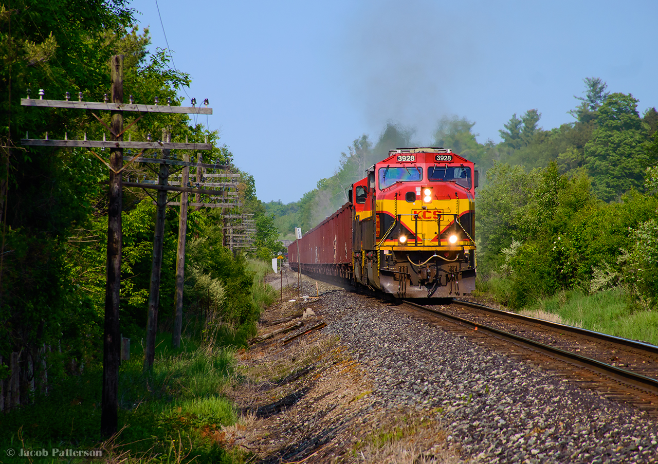 With Herzog equipment calibrated and ready, CPKC 9WGA begins its westward ballast dumping assignment under the steady hand of Engr. Young.  The movement would drop fresh rock between Guelph Junction and Orr's Lake, dumping in both Puslinch and Orr's Lake sidings as well as the main track.