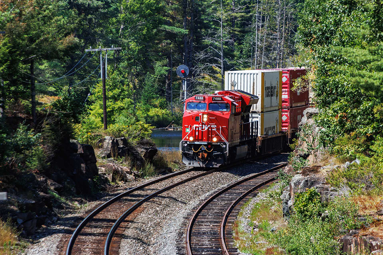 All the things that make Central Ontario great. Rocks, trees, water and the railroad. 112 at the Bala north switch, one of my favourite spots.
