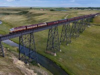 The Royal Canadian Pacific crosses the Little Bow River at Carmangay, on their deadhead trip back home to Ogden from Fort Steele.  