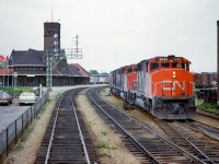 From the rear of an eastbound train, a triple set of GP40-2LWs work the yard at Brantford.

<br><br><i>Scan and editing by Jacob Patterson.</i>