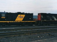 <b> Where's my notebook </b> <br>
RLK 1703 & RLK 3586 sit idle on the engine track in RaiLink's shop complex at North Bay, ON in this early to mid-1990's shot.