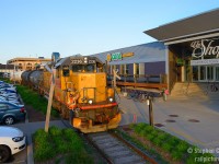 At the time this photo was taken, the ION LRT was a twinkle in the eyes of Regional Chair Ken Sieling, and the Waterloo spur ran right through the parking lot of the Waterloo Town Square mall where unsuspecting pedestrians and vehicles could find themselves too close to an active rail line. GEXR service on the Waterloo spur was four days a week and basically only in daylight when they departed early enough, and only on the longest days of the year, and it was about a 25% chance by my recollection.  Funny though, I had to move a shopping cart that was parked on the rails as my light was quickly diminishing and I didn't want any delay.... I wonder how the cart got there? hmmmmmmmmmmmmm... anyone know? This area is now a LRT station and has completely changed.



