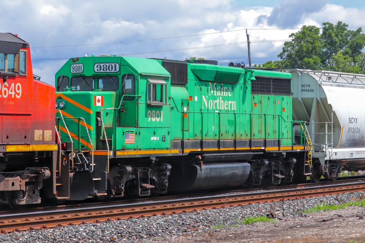 New Brunswick Southern 9801, a GP38-3 with Maine Northern lettering, trails 4th on CN M397. This was a very pleasant surprise, as I had no idea this was coming. This unit is off to be rebuilt, and eventually sent back to New Brunswick Southern.
