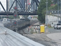 <b> Let the Journey Begin! </b> <br>
VIA 001 The Canadian begins another westbound journey across Canada as units VIA 6415, VIA 6432, and VIA 6438 pull the departing consist out of Union Station and pass under the Bathurst St., bridge at Mile 1.0 USRC Weston Sub. Toronto, ON this very pleasant July 30, 2025 morning.