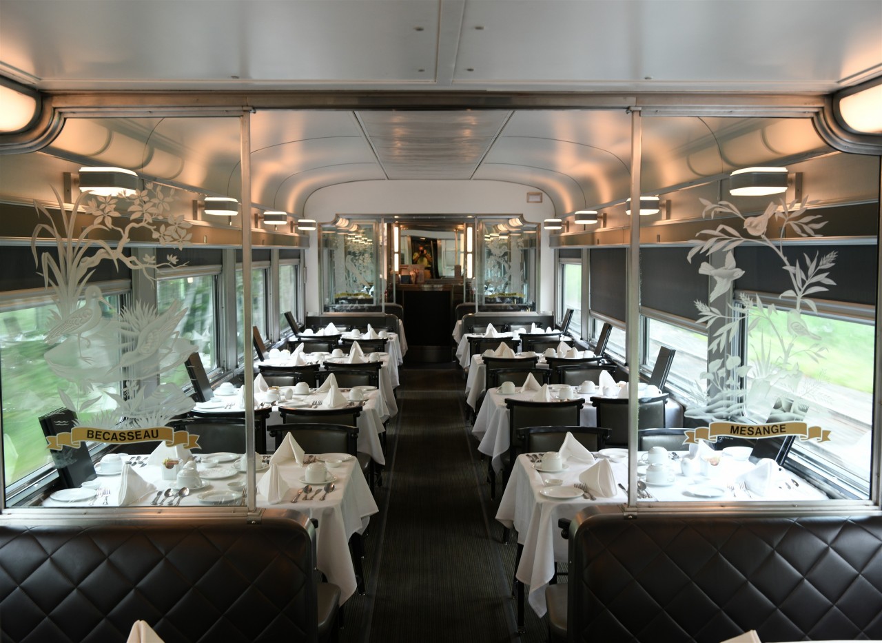 Dinner anyone?  
The tables are set for dinner on this July 30, 2025 afternoon on VIA 001 heading west from Toronto, ON. 
Kitchen/diner VIA 8407 Emerald has been beautifully refurbished and retains a lot of its original 1950's charm in both ambiance and service. 
It's always a treat at every meal on board The Canadian.