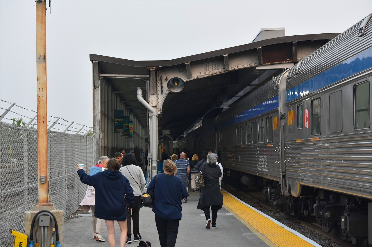 Ladies and Gentlemen, Welcome to Winnipeg  
VIA No. 1 The Canadian has pulled into the Winnipeg train shed and passengers detrain to the sound of announcements detailing local sites to see, and available off-train time and reboarding information coming through the platform speaker system. 
In a few minutes the platform will be closed to passengers as the train receives a full-service including, sewage dump, watering, fresh food and linens, head-end and on-board crew changes. 
All part of another great cross-Canada trip on The Canadian. :-)