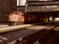 Canadian Pacific’s flagship passenger train No. 1 had FP7A CP 1416 leading and GP9 CP 8517 second on Thursday 1972-11-30 westward from Calgary.  In the distance, Budd RDC-2 CP 9113 off No. 302 had been my transport from South Edmonton (departing in a snowstorm) that morning, and No. 1 provided my coach seat to Vancouver, including a cab ride (with head office permission) with engineer Floyd Yeats from Banff to Field.

<p>As Calgary departure time approached, I was closely observing my pocket watch, and was disappointed when movement did not start on the 1600 schedule, only to realize moments later that we had indeed departed, so smoothly I had not noticed!

<p>On arrival in Vancouver, No. 1 was precisely one hour late, that is, until I realized my watch was still on Mountain Standard Time, so we were exactly on time.  At that point, I was on layoff from Victoria roundhouse, but that trip absolutely confirmed the adherence to on-time operation that was the expected daily performance then.