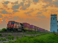 CN 3238 is leading their intermodel train through Dugald Manitoba just after sunrise. They are now on the final stretch into Winnipeg.