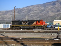 <Familiar sight </b> <br>
For the past several years, each time I visit or roll through Jasper, CN 2100 has been parked in the yard just east of the CN Operations building. <br>
Most times it is sitting idle, however, on occasion I have seen trainees out learning some skills that will help get them qualified for train service. <br>
That was not the case on this beautiful afternoon as CN 2100 basked in the warm sunshine under a clear blue sky. :-)