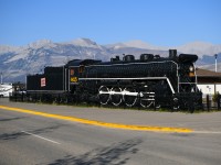 <b> Majestic </b> <br>
Background or foreground, take your pick. Both the mountains and the locomotive are majestic in their own right. <br>
CN 6015 continues to look great on its perch just west of the VIA station in Jasper, AB. The pigeons have taken up residence inside various openings in and around the cab, and a small tree is growing out the top of the tender right behind the cab roof. <br>
Another beauty day during my recent stay in Jasper. :-)