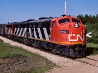 Nice sunny weather the morning before when this unit train went north as the 9171, 9190 & 9167. Ditto the weather at 18:30 the next day as it returned home. It made photographing the f units a delight. It had 36 sulphur loads coming around the bend to the hamlet of Coronado. On the tail end next to caboose 79286 was a scale test car (number unknown).